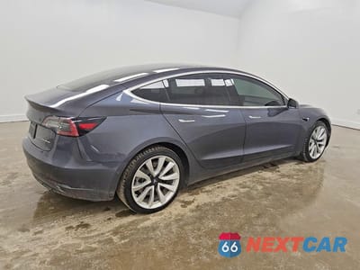 Trzecie zdjęcie samochodu z tyłu: 2018 TESLA MODEL 3 VIN:5YJ3E1EB3JF185257 - miniatura