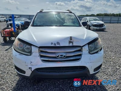 Piąte zdjęcie samochodu w środku: 2012 HYUNDAI SANTA FE GLS VIN:5XYZG3AB2CG114567 - miniatura