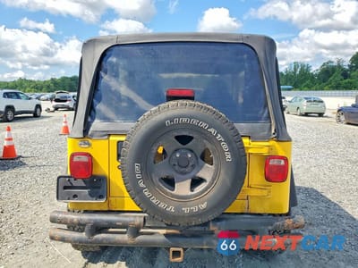 Zdjęcie 6 z 13 samochodu: 2001 JEEP WRANGLER / TJ SPORT VIN:1J4FA49S51P325149 - miniatura