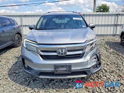 Piąte zdjęcie samochodu w środku: 2019 HONDA PILOT TOURING VIN:5FNYF6H64KB017241 - miniatura