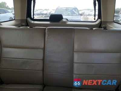 Zdjęcie 10 z 13 samochodu: 2003 FORD ESCAPE LIMITED VIN:1FMCU94193KE08316 - miniatura