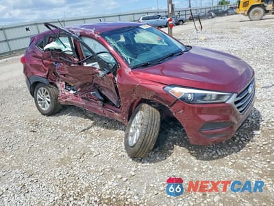 Czwarte zdjęcie samochodu z boku: 2017 HYUNDAI TUCSON SE VIN:KM8J23A43HU576392 - miniatura
