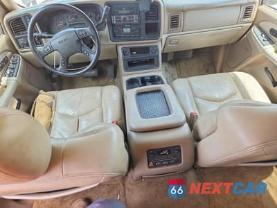 Zdjęcie 8 z 13 samochodu: 2003 GMC YUKON VIN:1GKEK13Z93J118633 - miniatura