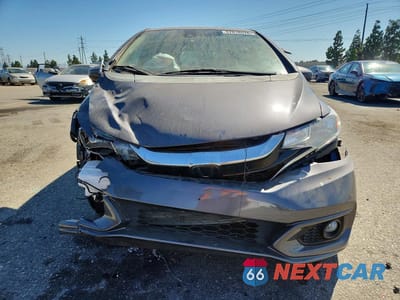 Piąte zdjęcie samochodu w środku: 2020 HONDA FIT EX VIN:3HGGK5H80LM712396 - miniatura