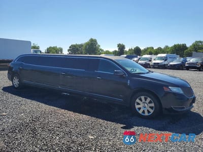 Czwarte zdjęcie samochodu z boku: 2015 LINCOLN MKT VIN:2L1MJ5LK7FBL01832 - miniatura