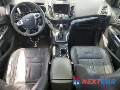 Zdjęcie 8 z 13 samochodu: 2013 FORD ESCAPE TITANIUM VIN:1FMCU0J93DUC13422 - miniatura