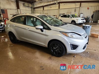 Czwarte zdjęcie samochodu z boku: 2013 FORD FIESTA S VIN:3FADP4AJ7DM224483 - miniatura