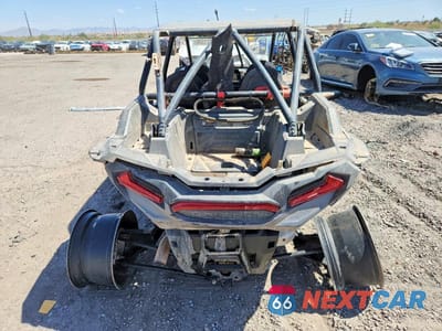 Czwarte zdjęcie samochodu z boku: 2021 POLARIS RZR TURBO UTILITY VEHICLE VIN:3NSN4E923MF141324 - miniatura