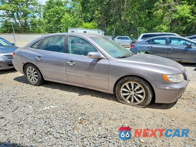 Czwarte zdjęcie samochodu z boku: 2006 HYUNDAI AZERA SE VIN:KMHFC46FX6A085934 - miniatura