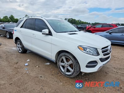 Czwarte zdjęcie samochodu z boku: 2016 MERCEDES-BENZ GLE 350 VIN:4JGDA5JB3GA731212 - miniatura