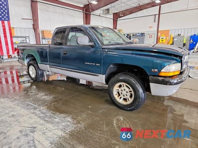 Czwarte zdjęcie samochodu z boku: 1997 DODGE DAKOTA VIN:1B7GG23X5VS131001 - miniatura