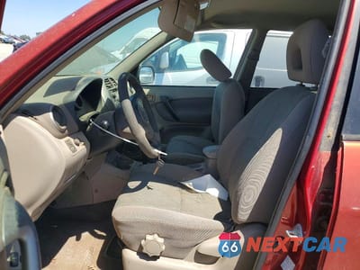 Zdjęcie 7 z 13 samochodu: 2002 TOYOTA RAV4 BASE VIN:JTEGH20V720049709 - miniatura