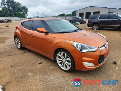Czwarte zdjęcie samochodu z boku: 2015 HYUNDAI VELOSTER BASE VIN:KMHTC6AD6FU244046 - miniatura