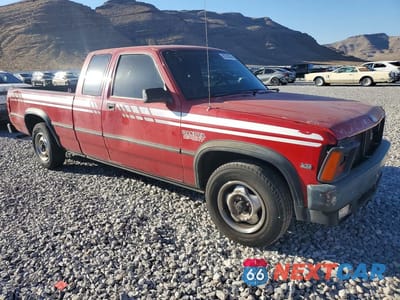 Czwarte zdjęcie samochodu z boku: 1990 DODGE DAKOTA SPORT VIN:1B7GL63X6LS702740 - miniatura