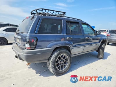 Trzecie zdjęcie samochodu z tyłu: 2002 JEEP GRAND CHEROKEE LAREDO VIN:1J4GW48S62C223679 - miniatura
