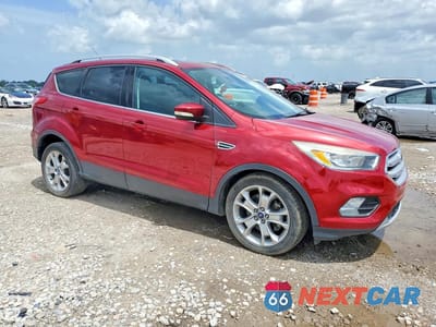 Czwarte zdjęcie samochodu z boku: 2014 FORD ESCAPE VIN:1FMCU0J94EUA47591 - miniatura