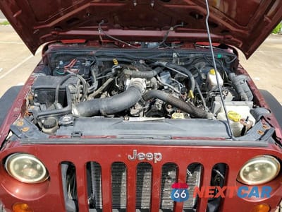 Zdjęcie 12 z 13 samochodu: 2008 JEEP WRANGLER UNLIMITED SAHARA VIN:1J4GA59138L644603 - miniatura