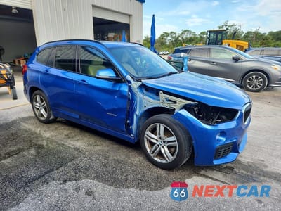 Czwarte zdjęcie samochodu z boku: 2018 BMW X1 SDRIVE28I VIN:WBXHU7C30J5H40261 - miniatura