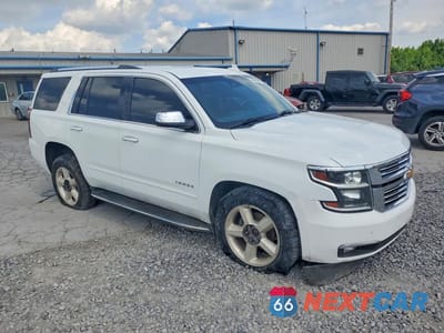 Czwarte zdjęcie samochodu z boku: 2018 CHEVROLET TAHOE K1500 PREMIER VIN:1GNSKCKC3JR239140 - miniatura