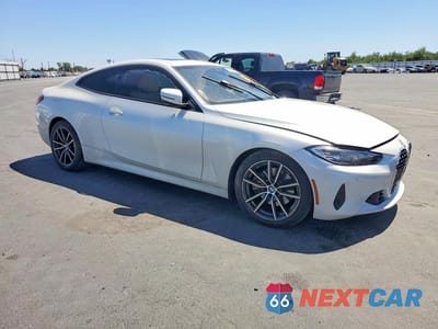 Czwarte zdjęcie samochodu z boku: 2022 BMW 430I VIN:WBA53AP09NCK33340 - miniatura