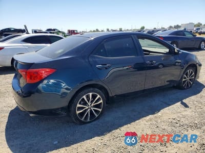 Trzecie zdjęcie samochodu z tyłu: 2017 TOYOTA COROLLA SE VIN:5YFBURHE8HP634675 - miniatura