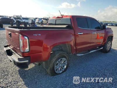 Trzecie zdjęcie samochodu z tyłu: 2016 GMC CANYON SLT VIN:1GTG6DE36G1181729 - miniatura