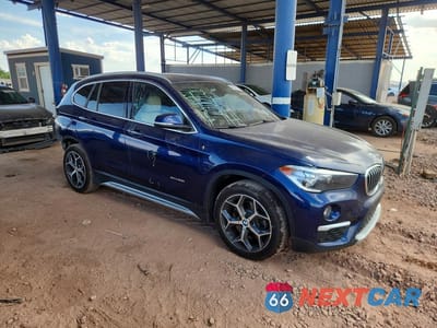 Czwarte zdjęcie samochodu z boku: 2018 BMW X1 SDRIVE28I VIN:WBXHU7C31J5H43055 - miniatura