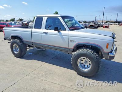 Czwarte zdjęcie samochodu z boku: 1987 FORD RANGER SUPER CAB VIN:1FTCR14T5HPA94246 - miniatura