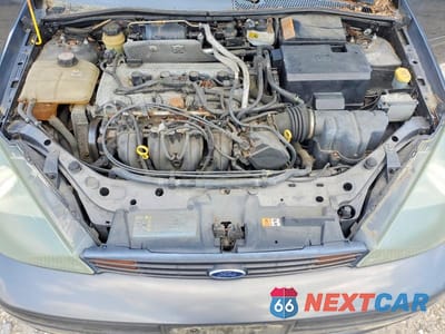 Zdjęcie 11 z 12 samochodu: 2004 FORD FOCUS ZX5 VIN:3FAFP37Z84R110902 - miniatura