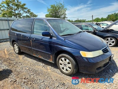 Czwarte zdjęcie samochodu z boku: 2004 HONDA ODYSSEY EXL VIN:2HKRL18984H500004 - miniatura