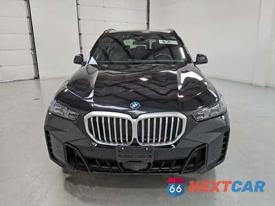 Piąte zdjęcie samochodu w środku: 2025 BMW X5 XDRIVE50E VIN:5UX43EU08S9Y42193 - miniatura