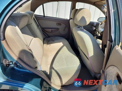 Zdjęcie 10 z 12 samochodu: 2003 KIA RIO BASE VIN:KNADC125636281761 - miniatura