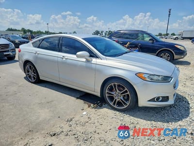 Czwarte zdjęcie samochodu z boku: 2016 FORD FUSION TITANIUM VIN:3FA6P0K9XGR211630 - miniatura