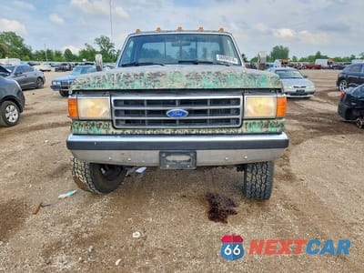 Piąte zdjęcie samochodu w środku: 1990 FORD F350 VIN:1FTHF36M9LNB17127 - miniatura