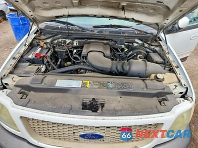 Zdjęcie 11 z 12 samochodu: 2003 FORD F150 SUPERCREW VIN:1FTRW08603KC71437 - miniatura
