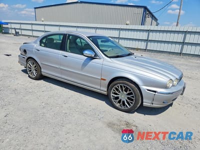 Czwarte zdjęcie samochodu z boku: 2002 JAGUAR X-TYPE 3.0 VIN:SAJEA51C32WC38972 - miniatura