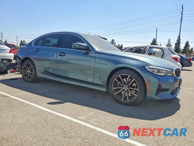 Czwarte zdjęcie samochodu z boku: 2020 BMW 330I VIN:3MW5R1J02L8B31566 - miniatura