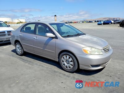 Czwarte zdjęcie samochodu z boku: 2003 TOYOTA COROLLA LE VIN:1NXBR32E33Z109103 - miniatura