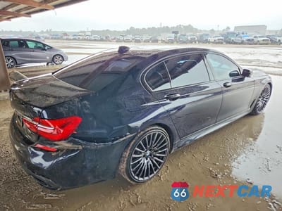 Trzecie zdjęcie samochodu z tyłu: 2019 BMW 740 I VIN:WBA7E2C55KB217261 - miniatura