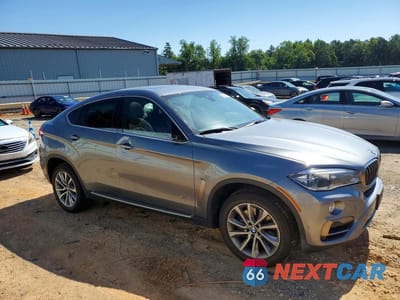 Czwarte zdjęcie samochodu z boku: 2017 BMW X6 XDRIVE50I VIN:5UXKU6C33H0S99757 - miniatura