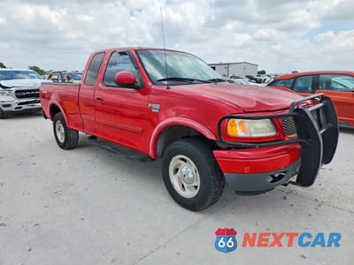 Czwarte zdjęcie samochodu z boku: 2000 FORD F150 VIN:1FTRX18L5YKB02966 - miniatura