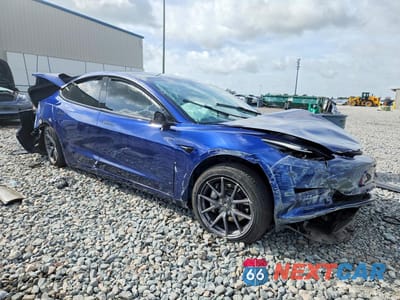 Czwarte zdjęcie samochodu z boku: 2021 TESLA MODEL 3 VIN:5YJ3E1EB2MF032678 - miniatura