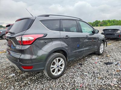 Trzecie zdjęcie samochodu z tyłu: 2018 FORD ESCAPE SE VIN:1FMCU0GD9JUB85875 - miniatura