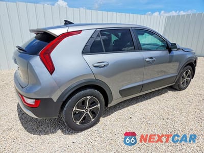 Trzecie zdjęcie samochodu z tyłu: 2026 KIA NIRO LX VIN:KNDCP3LE2T5335253 - miniatura