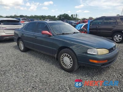 Czwarte zdjęcie samochodu z boku: 1993 TOYOTA CAMRY XLE VIN:4T1SK13E9PU248682 - miniatura