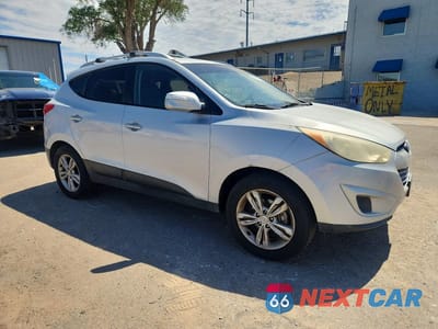 Czwarte zdjęcie samochodu z boku: 2012 HYUNDAI TUCSON GLS VIN:KM8JU3AC2CU521684 - miniatura