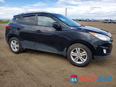 Czwarte zdjęcie samochodu z boku: 2012 HYUNDAI TUCSON GLS VIN:KM8JUCAC5CU497039 - miniatura