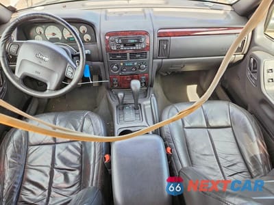Zdjęcie 8 z 13 samochodu: 2001 JEEP GRAND CHEROKEE LIMITED VIN:1J4GW58N41C515474 - miniatura