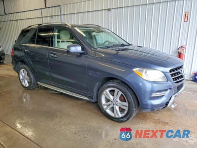 Czwarte zdjęcie samochodu z boku: 2014 MERCEDES-BENZ ML 350 BLUETEC VIN:4JGDA2EB1EA333423 - miniatura