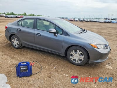 Czwarte zdjęcie samochodu z boku: 2012 HONDA CIVIC HYBRID VIN:JHMFB4F24CS004029 - miniatura